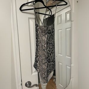 Boutique brand bodysuit, size M but would also fit a S